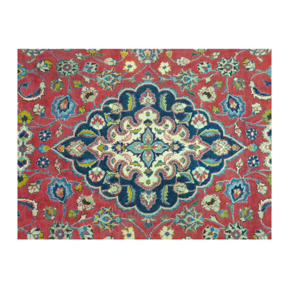 Medallion detail of Vintage Mashad wool rug with ivory, navy and teal floral accents on rose-red field, 290 x 186 cm
