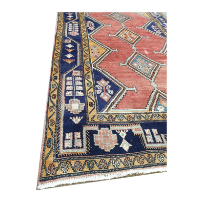 Close-up of Vintage Persian Afshar wool rug showing navy border detail, fringe edge and hand-knotted pile texture, 250 x 147 cm