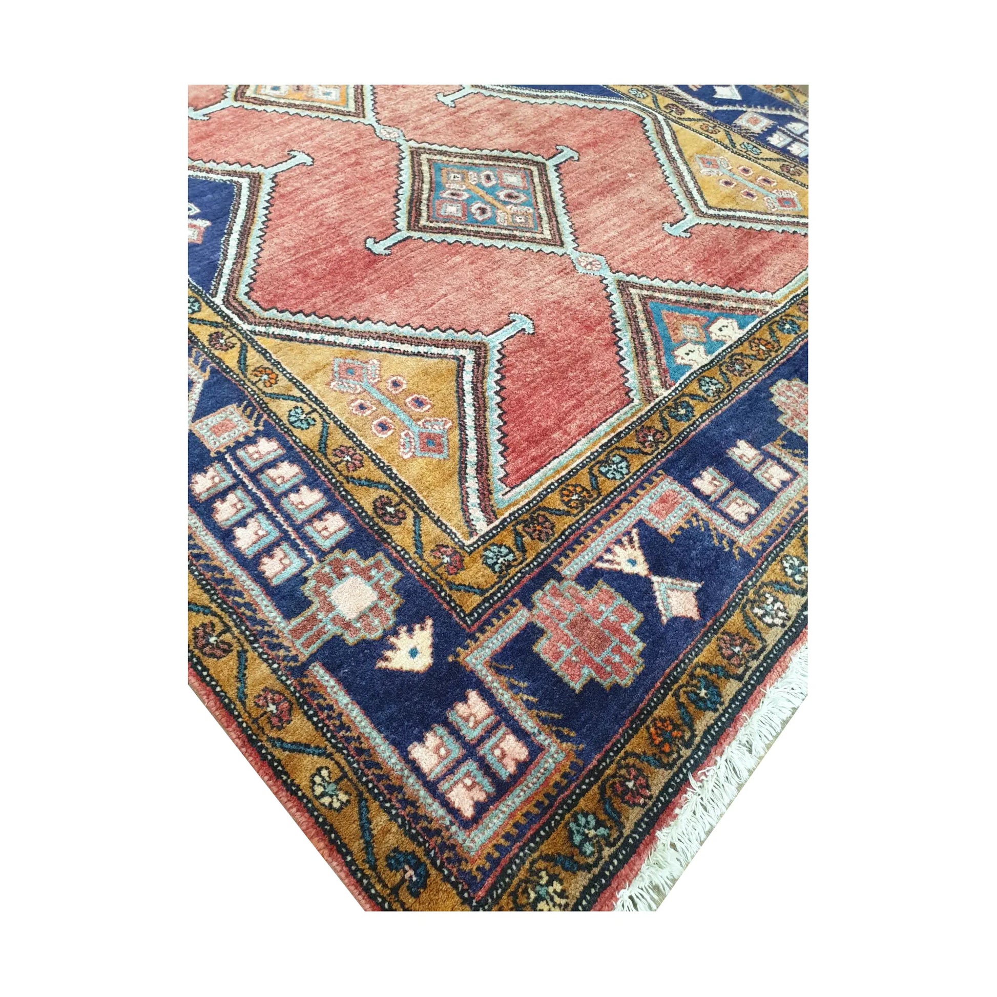 Corner detail of Vintage Persian Afshar rug showing navy and mustard border, red field and geometric motifs, 250 x 147 cm