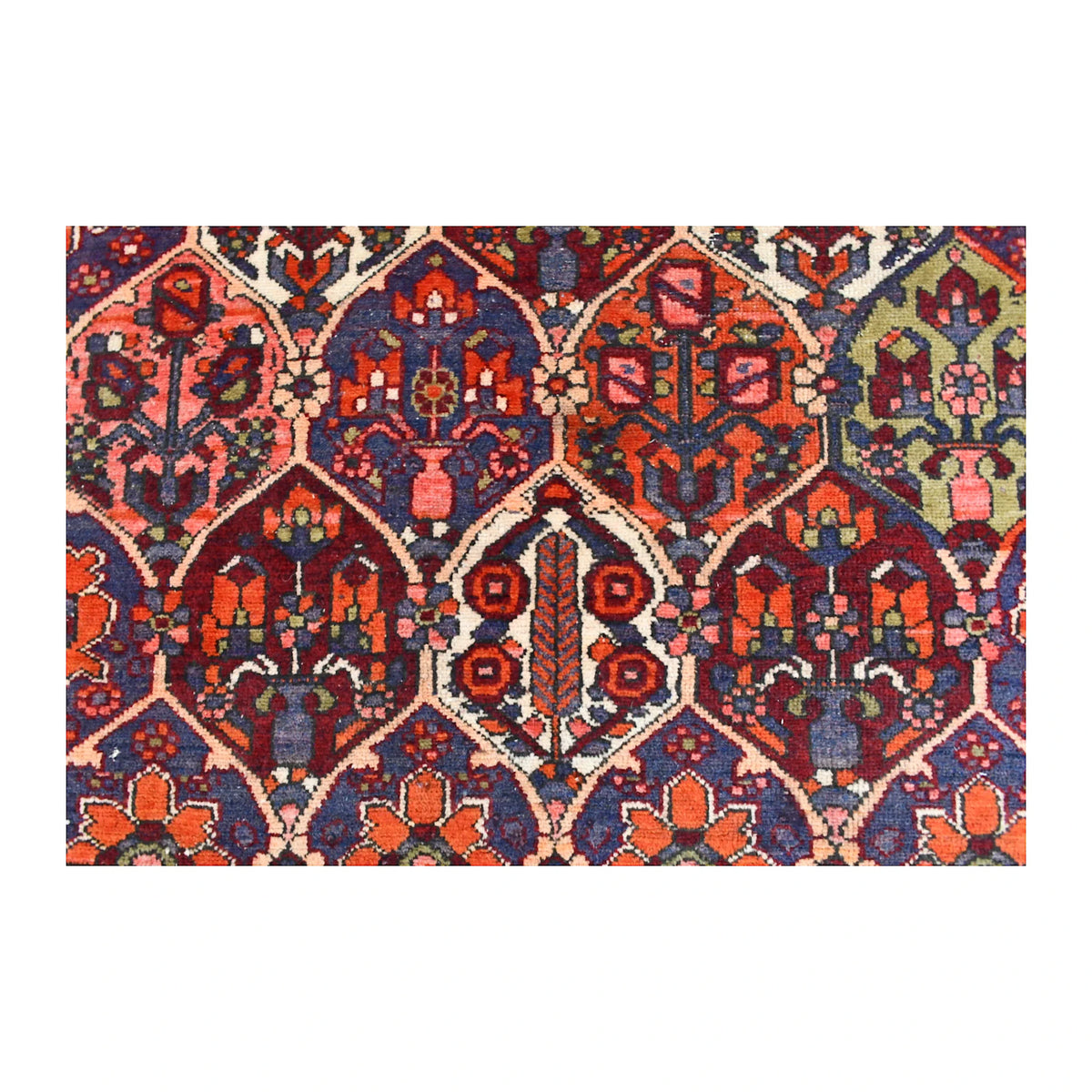 Detailed view of Bakhtiari Khesti field showing stylised flowering trees and vase motifs within burgundy, orange, indigo and ivory panels