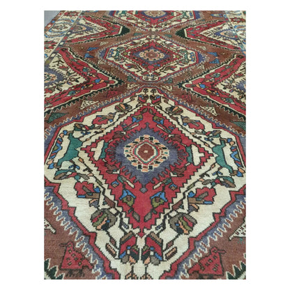 Diamond medallion detail on vintage Persian Bakhtiari hand-knotted wool rug