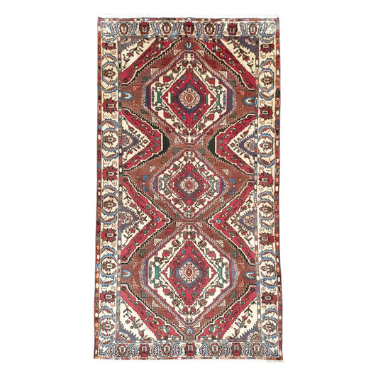 Full view of vintage Persian Bakhtiari hand-knotted wool rug 287 x 155 cm with diamond medallion design