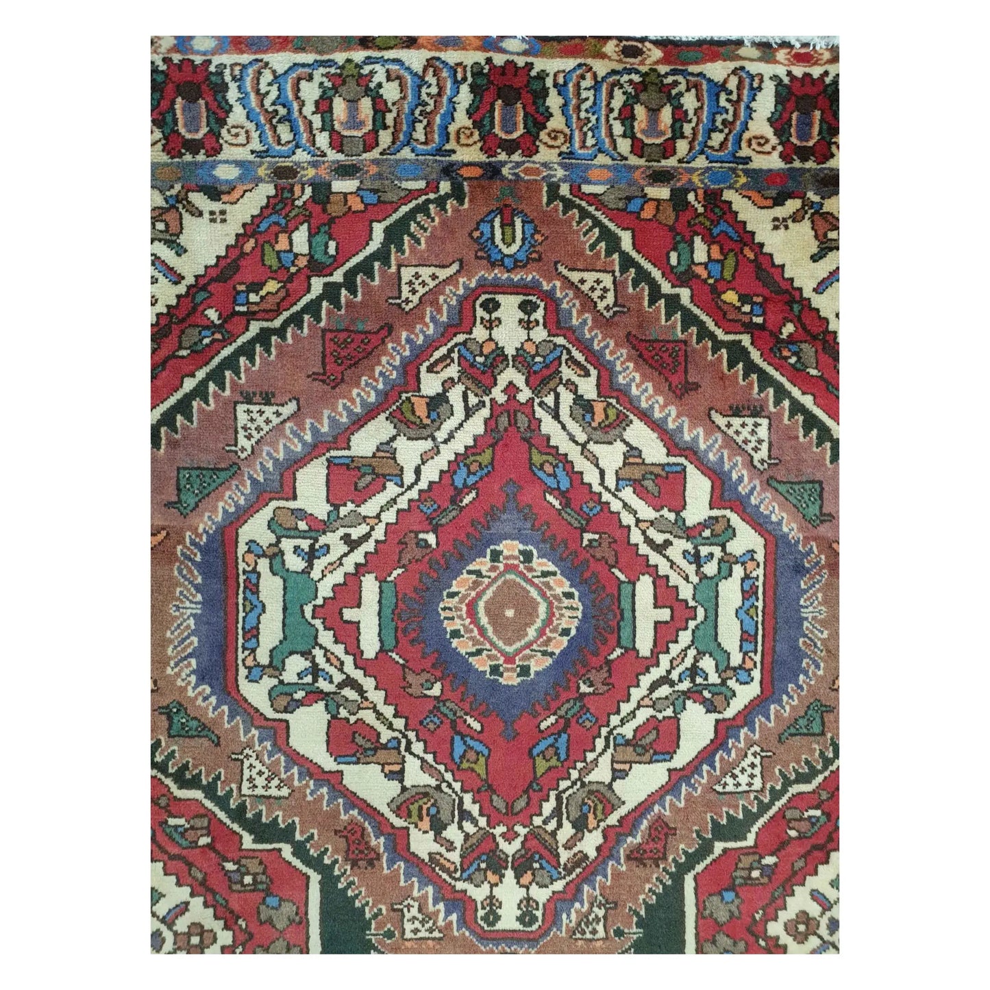 Top section detail of vintage Persian Bakhtiari rug with multi-colour geometric pattern