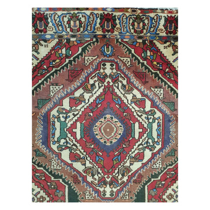 Top section detail of vintage Persian Bakhtiari rug with multi-colour geometric pattern