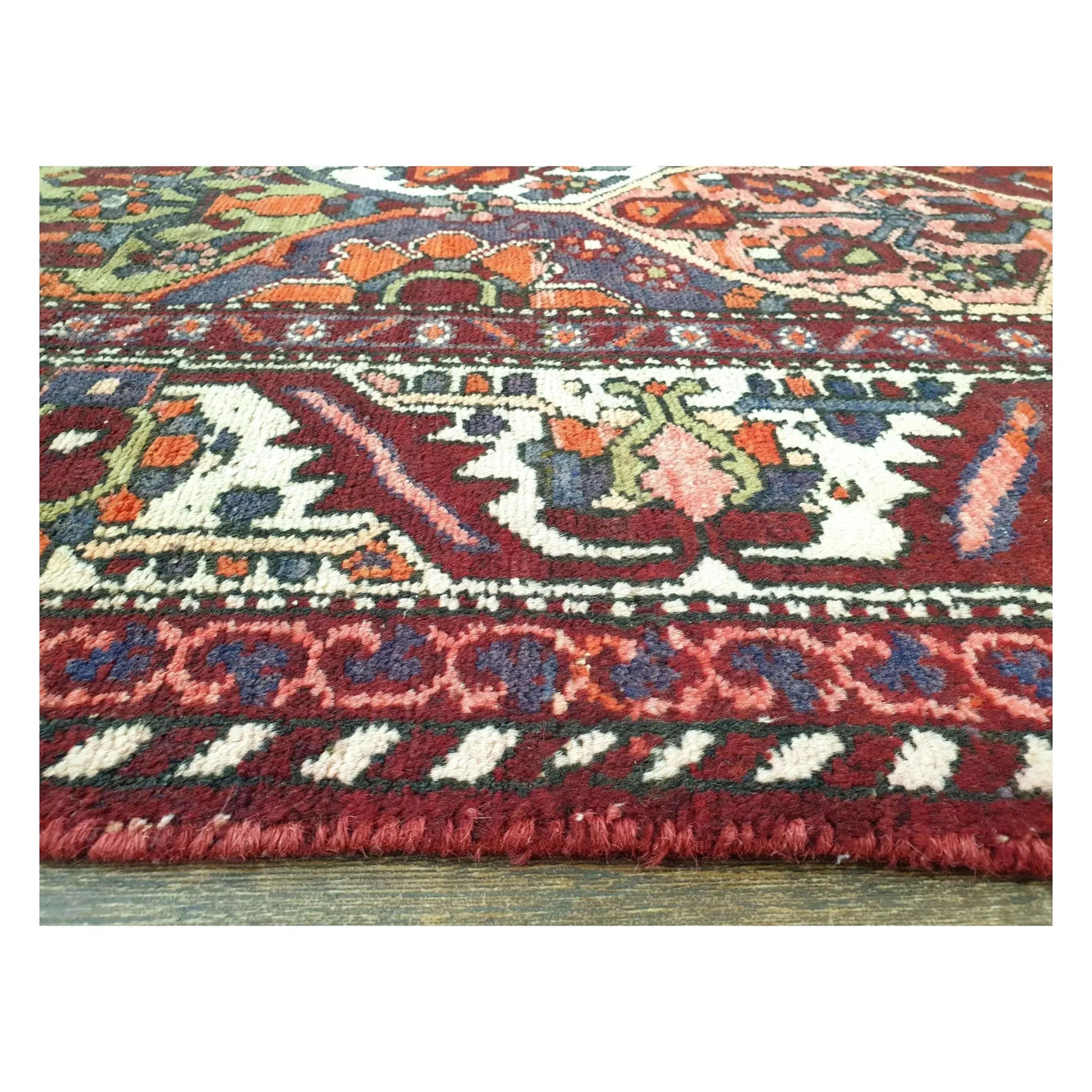 Close-up border and pile detail of Persian Bakhtiari hand-knotted wool rug