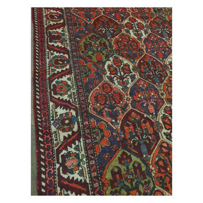 Field and side border detail of vintage Persian Bakhtiari rug with garden panel motifs