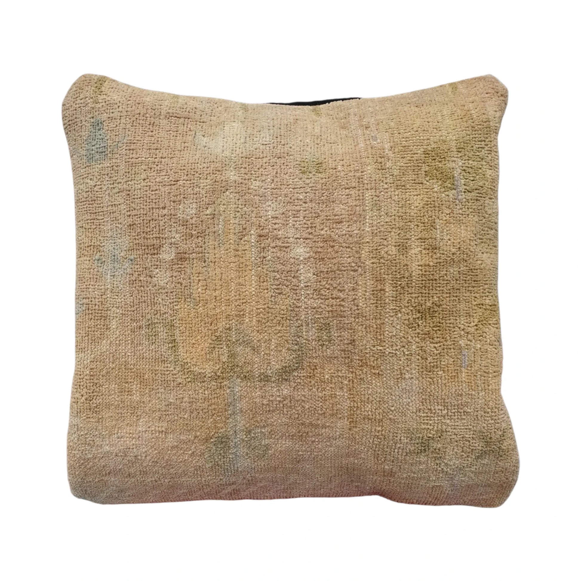 Front view of vintage Persian beige rug cushion cover with faded central medallion, approximately 45 x 45 cm