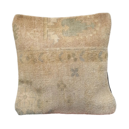 Front view of vintage Persian beige overdyed cushion cover with faded sage-grey pattern, approximately 45 x 45 cm