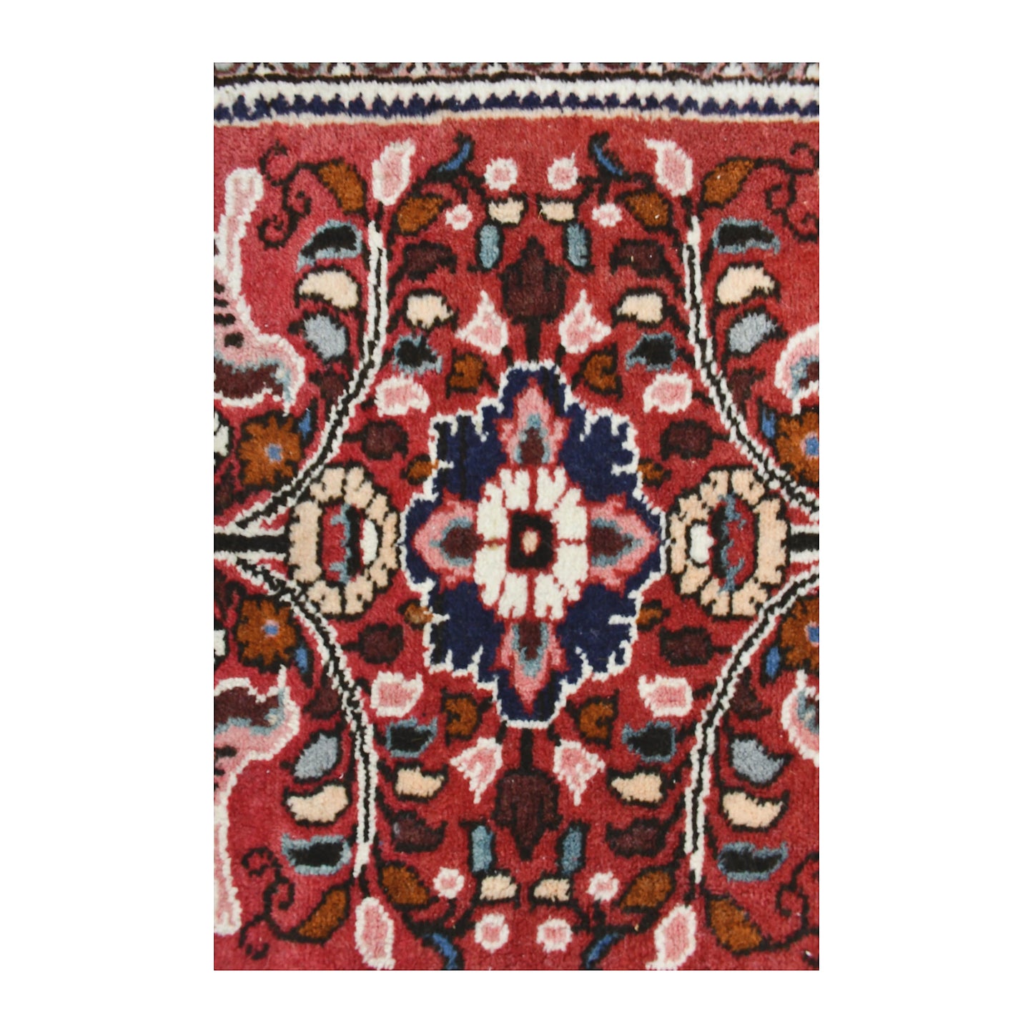 Central medallion detail of vintage Persian Hamadan wool rug showing deep red field, ivory animal motifs and dark outlined pattern