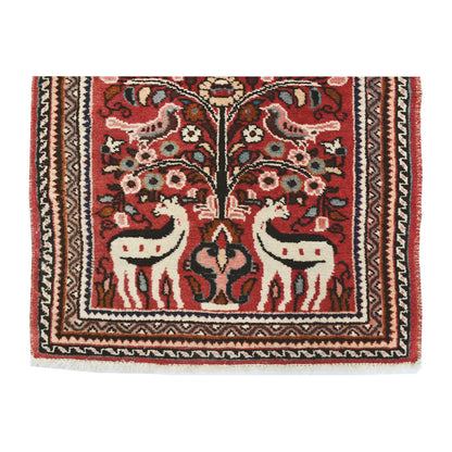 End border and fringe detail of vintage Persian Hamadan hand-knotted rug showing animal motifs, floral details and layered border