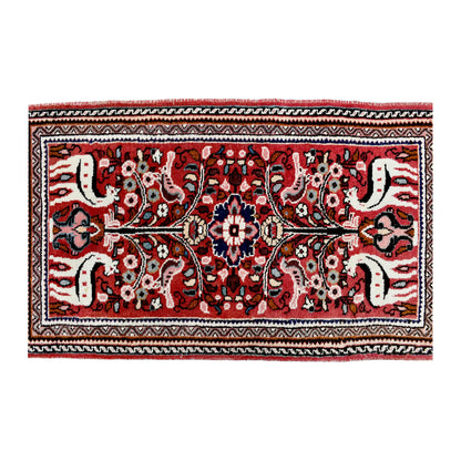 Full field design detail of vintage Persian Hamadan hand-knotted wool rug showing animal motifs, medallion layout and geometric border