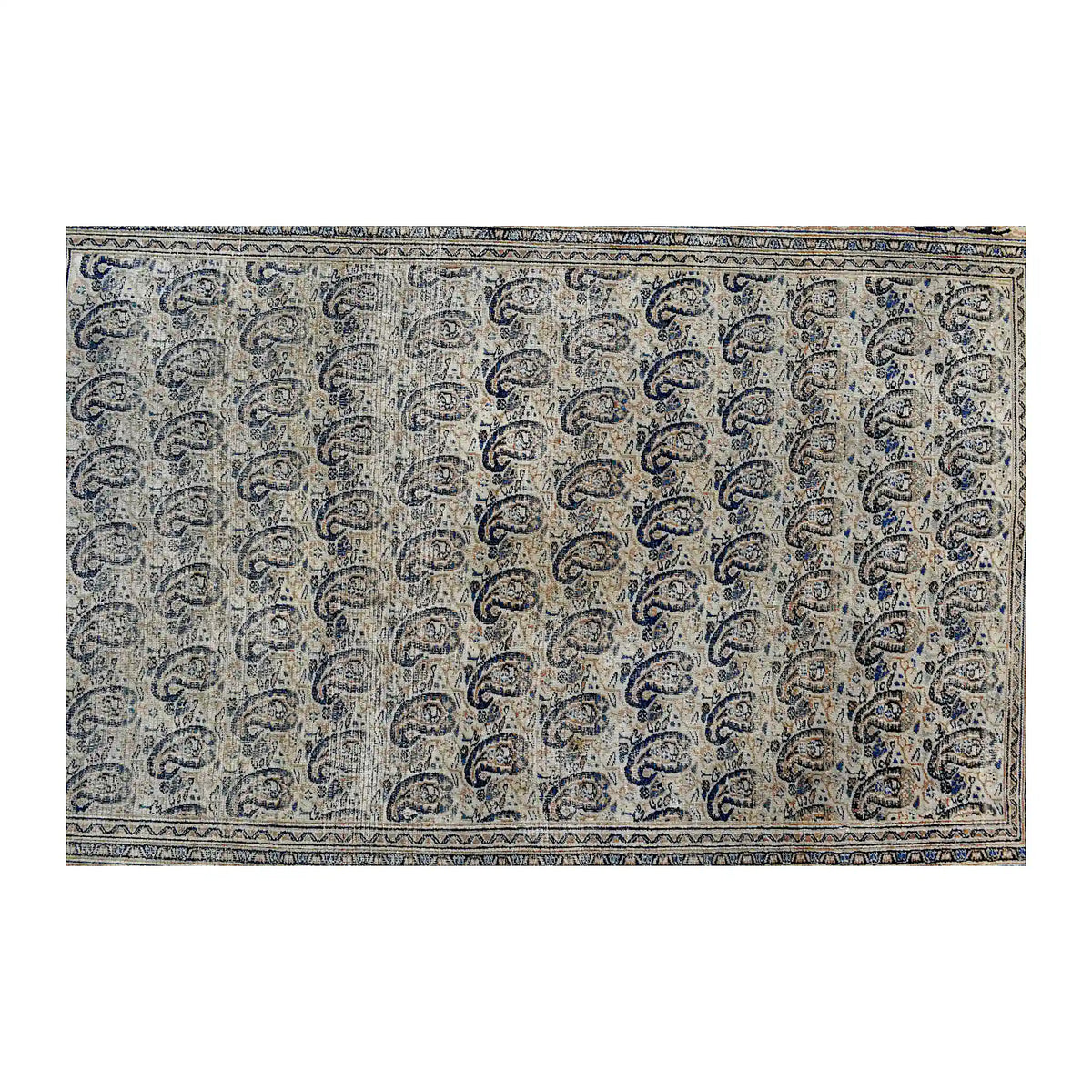 Field detail of vintage Persian rug showing dense rows of dark blue boteh motifs across a soft grey ground