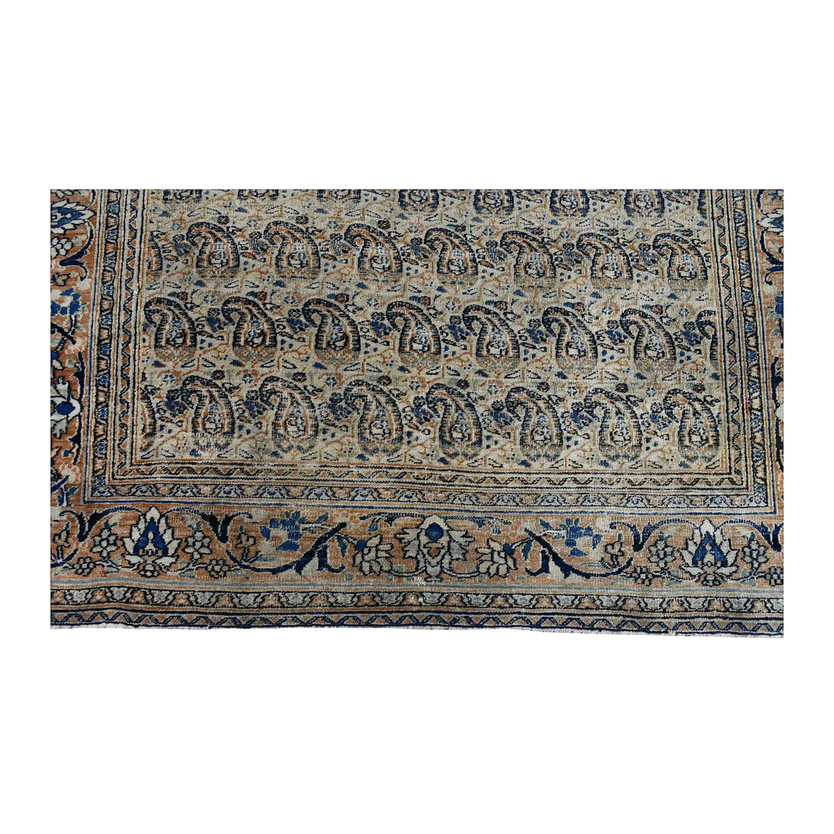 Fringe and end-border detail of Persian Mashad Dorakhash rug with muted blue, rose and terracotta floral motifs