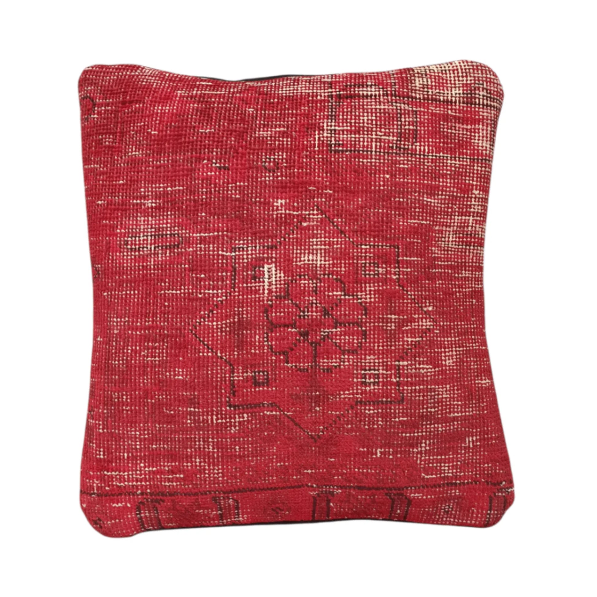 Front view of vintage Persian red overdyed cushion cover with central floral medallion, approximately 45 x 45 cm