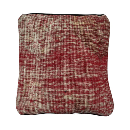 Front view of vintage Persian red and ivory overdyed cushion cover with dense crosshatched pattern, approximately 45 x 45 cm