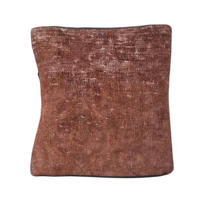 Front view of vintage Persian rust-brown overdyed rug cushion cover, approximately 45 x 45 cm