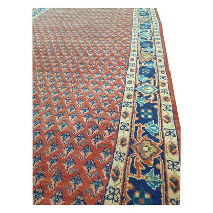 Angled border and field detail of Vintage Persian Sarouk Mir Boteh wool runner rug with blue and ivory border, 355 x 135 cm