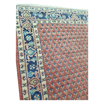 Corner border and field detail of Vintage Persian Sarouk Mir Boteh wool runner rug with ivory, blue and red pattern, 355 x 135 cm