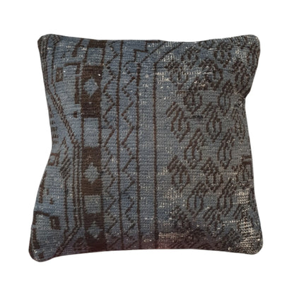 Front view of vintage Persian slate blue overdyed cushion cover with dark brown floral and border motifs, approximately 45 x 45 cm