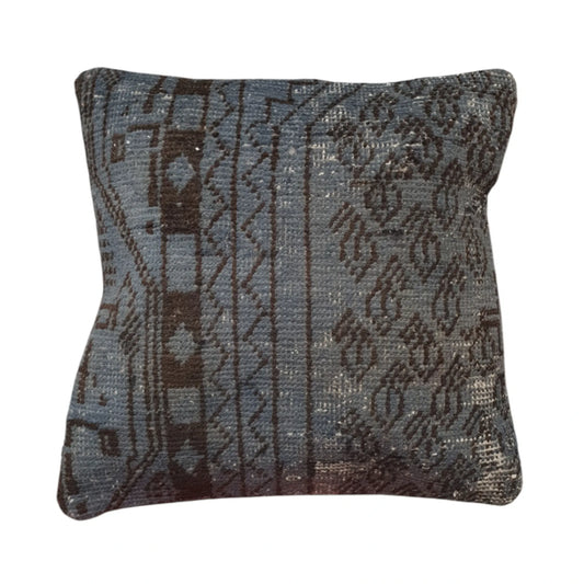 Front view of vintage Persian slate blue overdyed cushion cover with dark brown floral and border motifs, approximately 45 x 45 cm