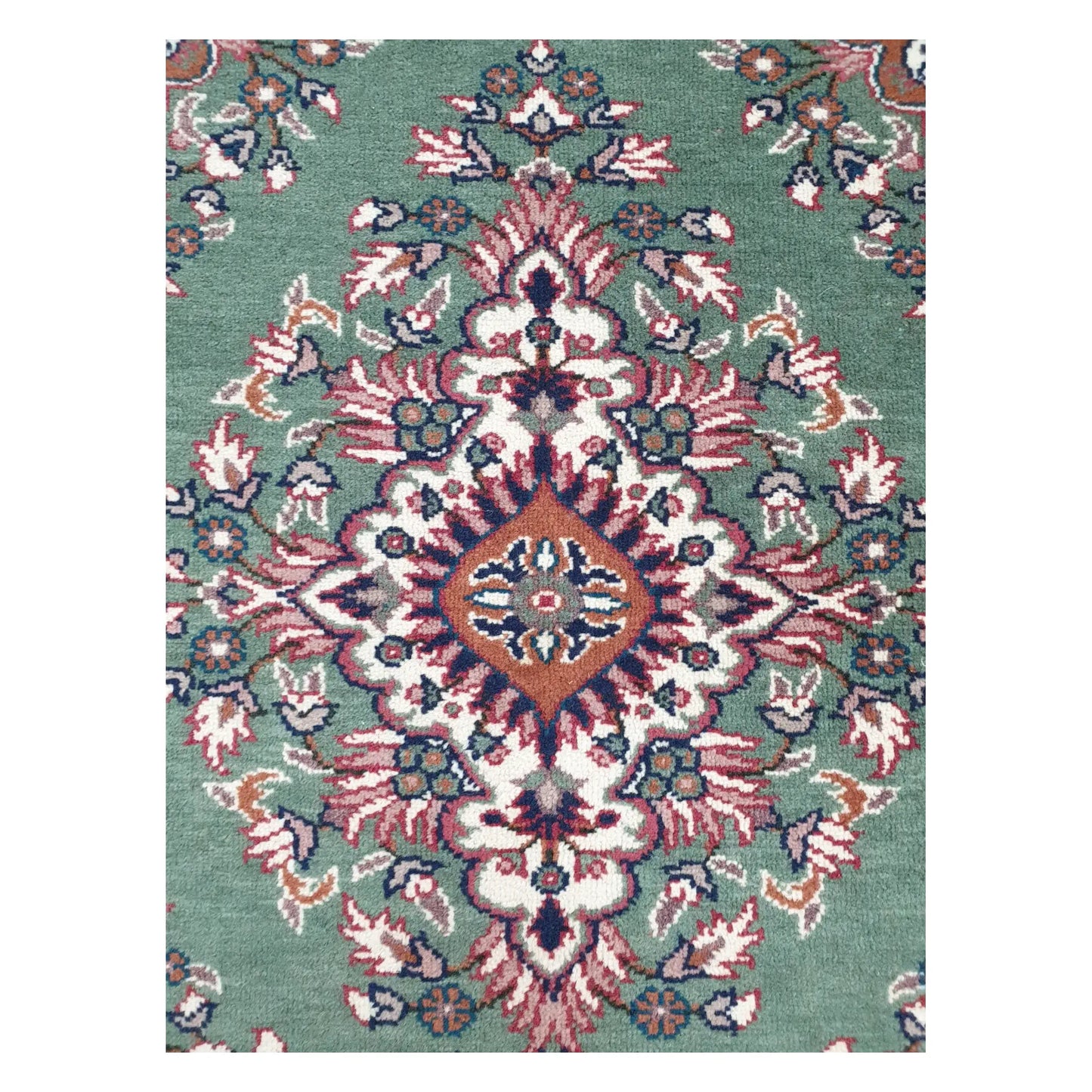 Close-up of the central medallion on a vintage Persian Tabriz fine hand-knotted wool rug