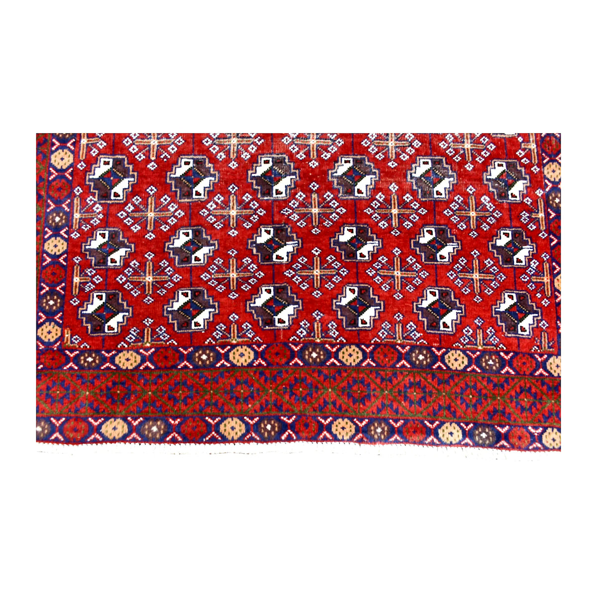 Fringe and end-border detail of vintage Turkoman rug with deep red, dark navy, orange and ivory geometric motifs