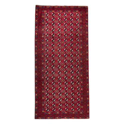 Full view of vintage Persian Turkoman hand-knotted wool rug 283 x 136 cm with red field