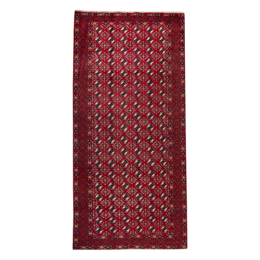 Full view of vintage Persian Turkoman hand-knotted wool rug 283 x 136 cm with red field