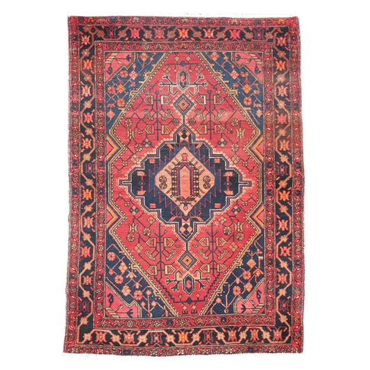 Full view of vintage Persian Zanjan wool rug 200 x 138 cm with red field and geometric medallion