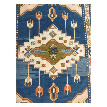 Close detail of the geometric pattern and colour variation in a vintage Turkish Anatolian wool rug