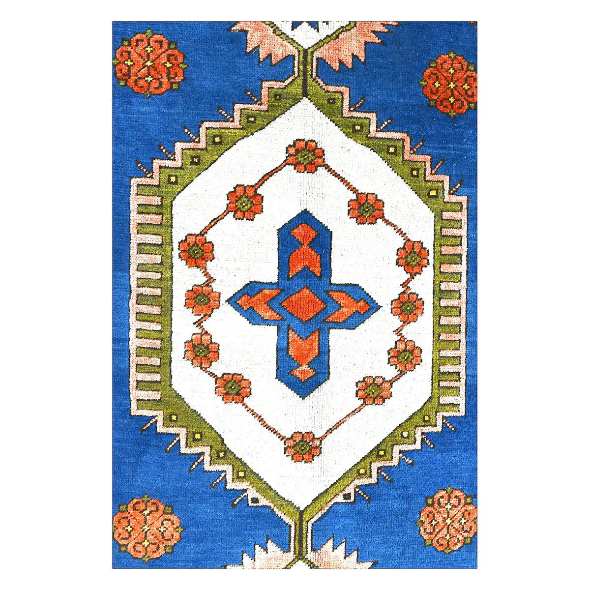 Central medallion close-up of Anatolian wool rug with ivory ground, red and navy geometric emblem and small floral motifs