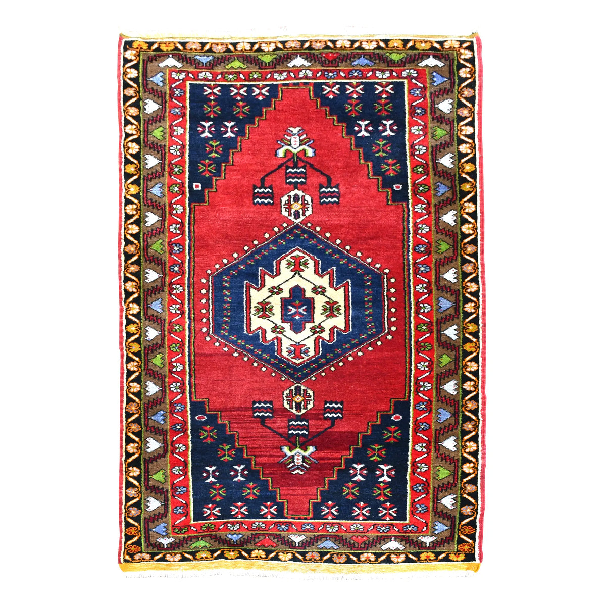 Full view of vintage Turkish Yahyali hand-knotted wool rug with red field, ivory-centred navy medallion and patterned borders, 232 x 120 cm