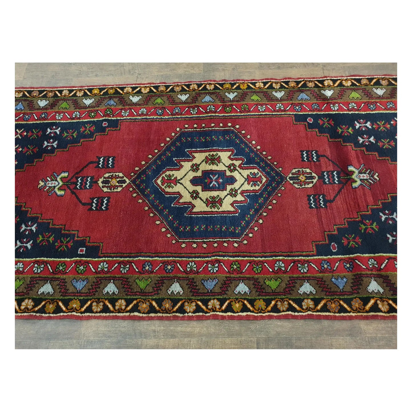 Medallion field view of vintage Turkish Yahyali rug with layered geometric borders