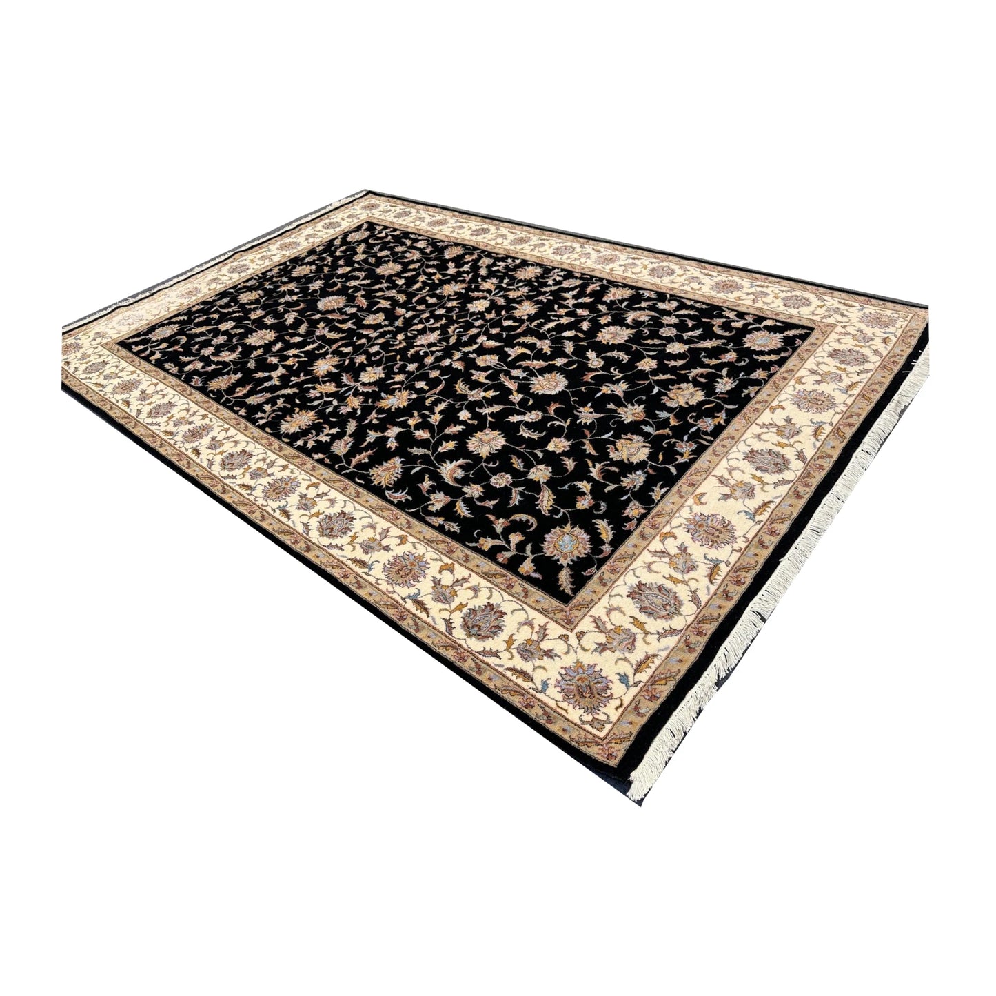Angled full view of black Ziegler hand-knotted wool and silk rug with beige border