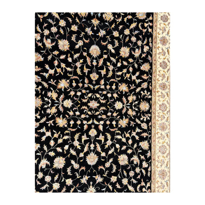 Close-up of black Ziegler rug showing the detailed floral field and beige border
